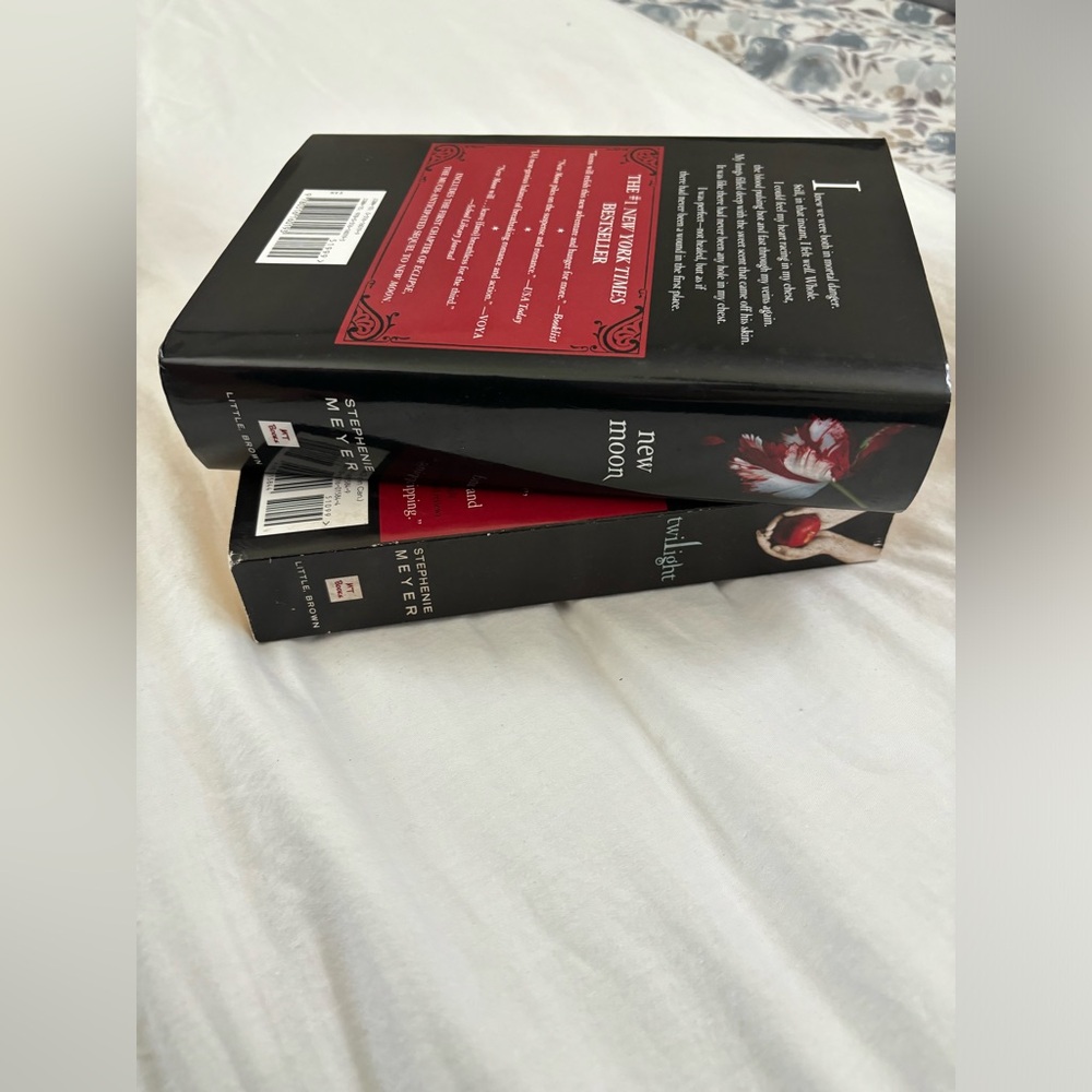 TWILIGHT (soft cover) NEW MOON (hard cover).